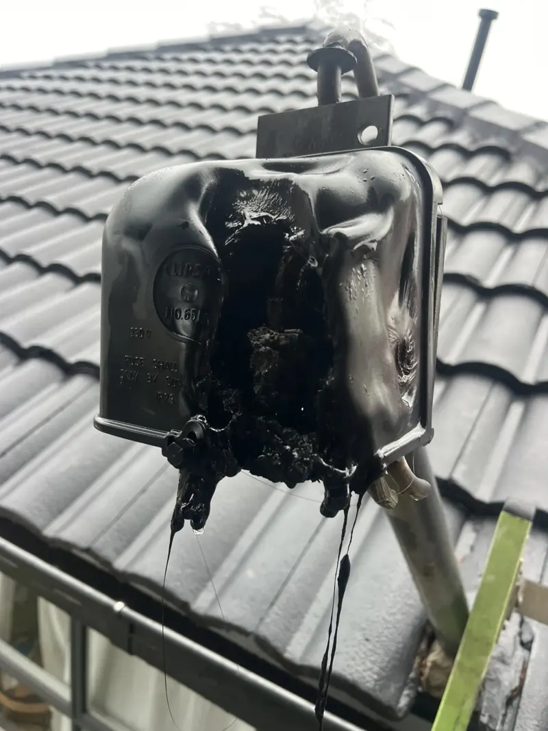 Burnt out service fuse removed from a Melbourne home during emergency electrical work
