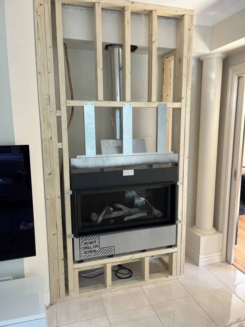 Wall framed up and rewired mid-renovation by Pender Electrical