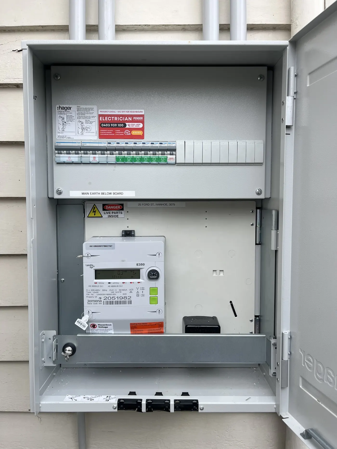 New switchboard and meter box with the Pender Electrical sticker inside the door